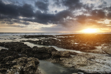 Stunningrocky beach sunset landscape long exposure
