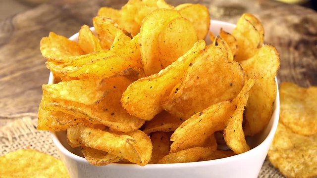 Portion of rotating Potato Chips as not loopable 4K UHD footage