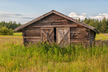 Traditional hay barn near Kalix during a summer evening in northern Sweden