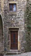 Fototapeta premium Cobblestones wall facade on a farmhouse town