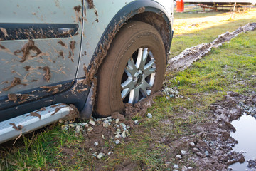 Fototapeta na wymiar Car stuck in the mud
