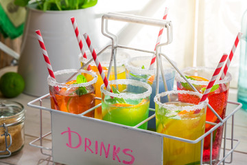 Cold drink with straw and fruits