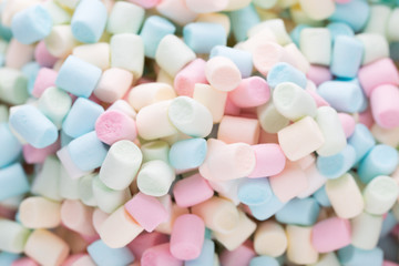 Background or texture of colorful mini marshmallows.