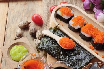 Sushi roll with shrimp eggs is delicious.