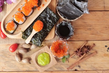 Sushi roll with shrimp eggs is delicious.