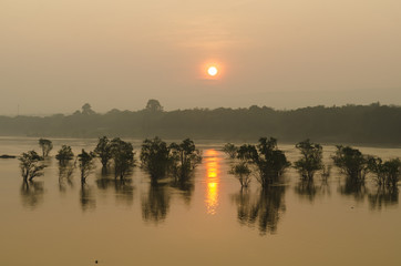 Obraz na płótnie Canvas Sunset landscape at the river in Ubon Ratchathani Thailand.