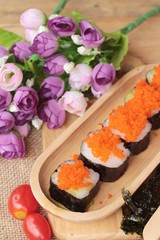 Sushi roll with shrimp eggs is delicious.