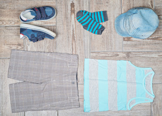 Flat lay photography of boy's casual outfit. 