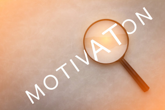 Motivation Word With Magnifier.jpg