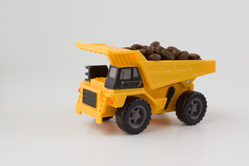 toy vehicles work with coffee beans