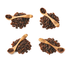 Wooden spoon over the pile of raisins