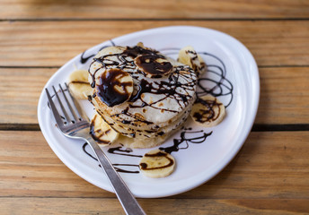 Pancakes with Banana and Chocolate Sauce