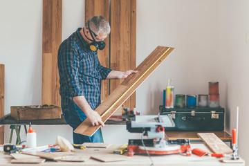 Carpanter working in his workshop.