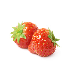 Pair of red strawberries isolated