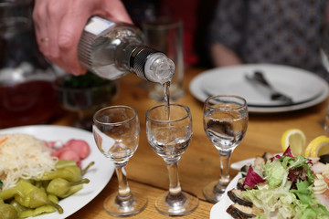 Person filling vodka