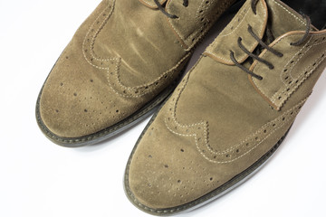 brown used budapester suede shoes on white background