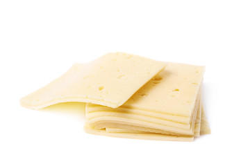 Pile of cheese slices isolated