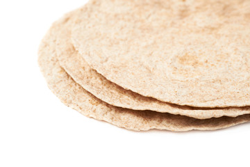 Pile of wheat tortillas isolated