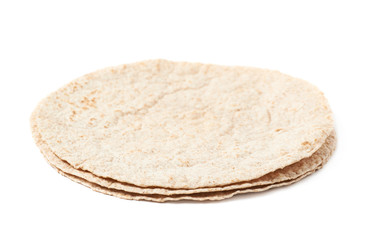 Pile of wheat tortillas isolated