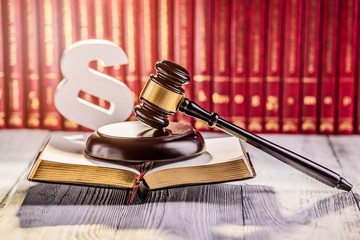 Gavel and wooden paragraph