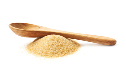 Spoon over pile of sugar