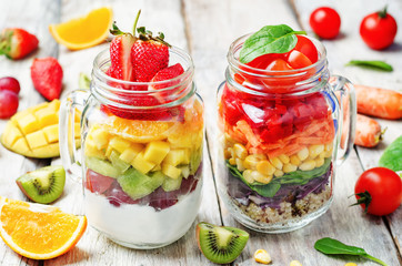 homemade rainbow salads with vegetables, quinoa, Greek yogurt an