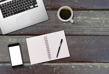 Office business desk mock up with smart devices on wooden background. View from above