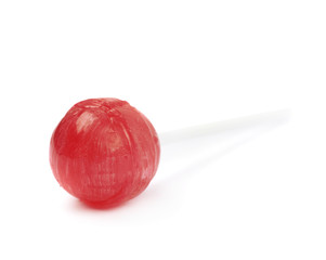 Red lollipop candy isolated