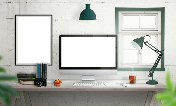 Computer display on office desk. Isolated, white screen for mockup. Creative modern desk with books, camera, keyboard, mouse, muffin, lamp, tea. Isolated picture, poster frame on wall