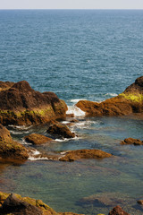 Lava coast of the island Madeira in the Atlantic Ocean. Portugal