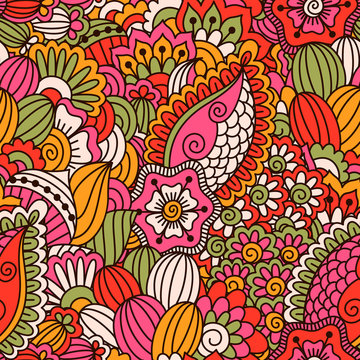 Hand drawn seamless pattern with floral elements. Colorful ethnic background. Pattern can be used for fabric, wallpaper or wrapping