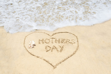 Fototapeta na wymiar Mothers day background on the beach
