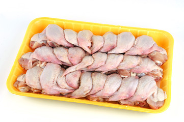fresh chicken wings in container