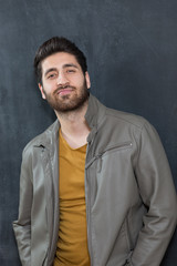 Fototapeta premium Portrait of masculinity. Portrait of handsome young bearded mans