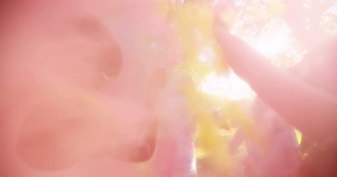 Friends Throwing Holi Powder at Each Other