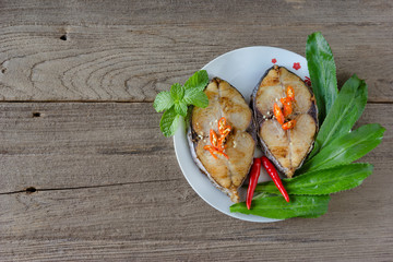 King mackerel steak on wood background,fried fish