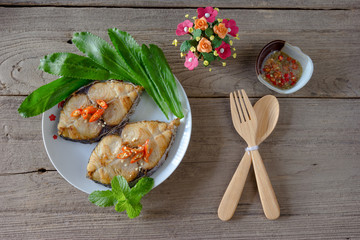 King mackerel steak on wood background,fried fish