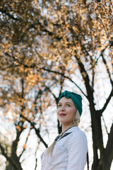 Happy woman in spring time . Young girl relax outdoors. Freedom