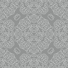 Seamless background with abstract ethnic pattern.