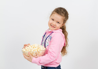 Portrait of a little girl with popcorn