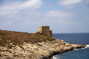 Fototapeta na wymiar Medieval watch tower on Malta's bank
