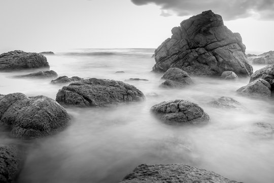 rock beach in black and white with long exposure photography