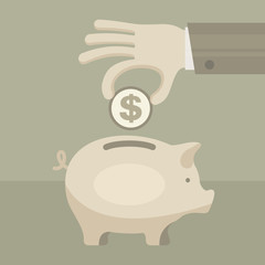 Piggy coin bank in hand