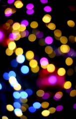 Defocused light blur bokeh on black background