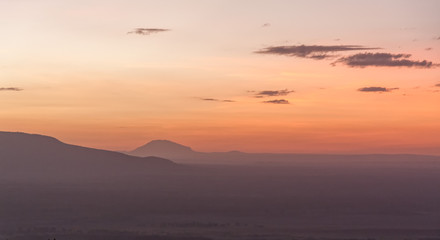 Morning glow against mountains background. Manyara Lake National Park, Tanzania.