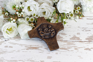 Bronzekreuz mit Rosen