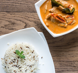 Thai panang curry with bowl of white and wild rice