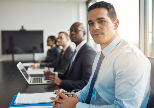 Young Hispanic Businessman In A Meeting