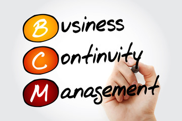 Hand writing BCM - Business Continuity Management with marker, acronym business concept