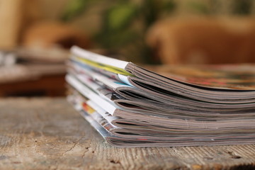 Magazines on the wooden table